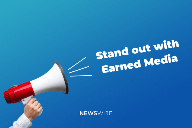 Picture of a red and white megaphone with a blue background. Text reads, Stand out with Earned Media.