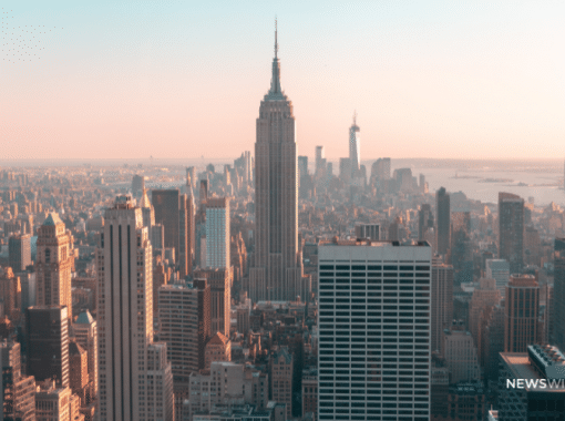 Picture of the Empire State building and part of the New York skyline. Image is being used for a Newswire blog post about the top media outlets in New York.