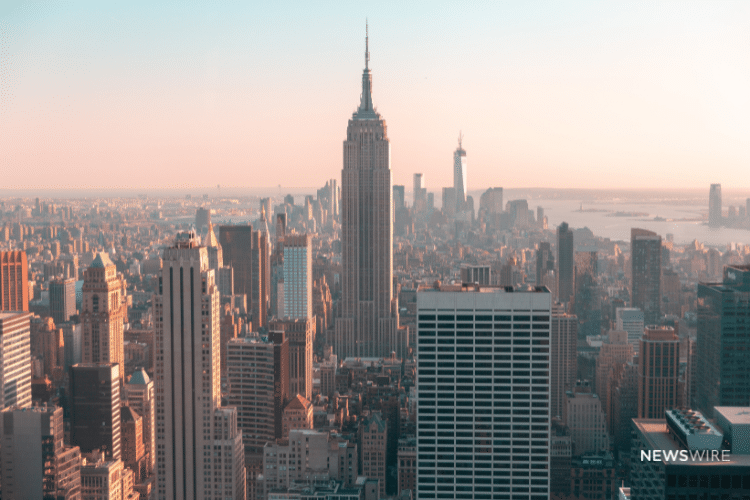 Picture of the Empire State building and part of the New York skyline. Image is being used for a Newswire blog post about the top media outlets in New York.