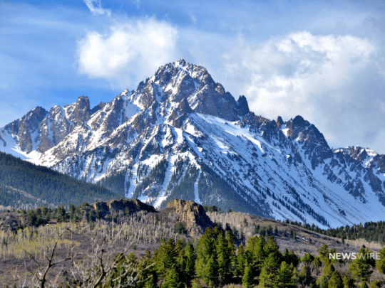 Picture of the Colorado Rocky Mountains. Image is used for a Newswire blog post about the Top Media Outlets in Colorado.
