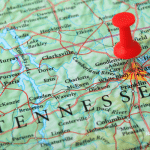 Picture of Tennessee on a map with a red pin. Image used for a Newswire blog about the top media outlets in Tennessee.