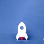 Picture of a white rocket ship on a blue background. Image is being used for a Newswire blog post about a new company launch press release.